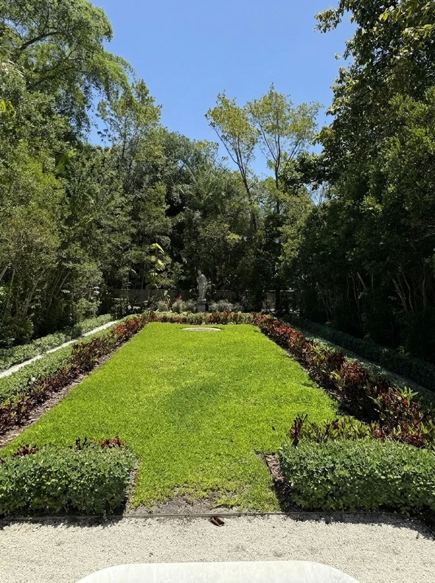 Lawn and trimmed flower beds in a villa garden in Marrakech