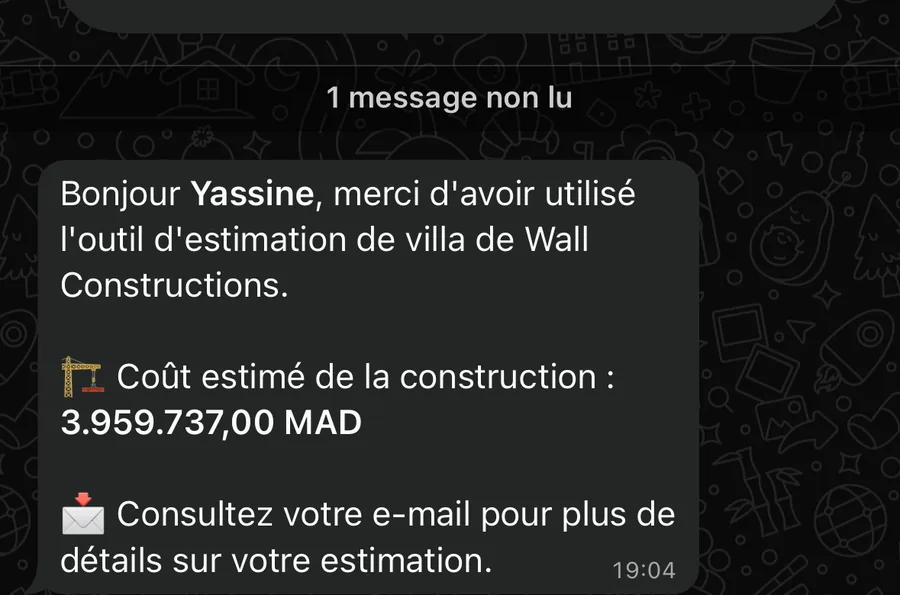 WhatsApp message from WALL Construction showing the estimated villa cost
